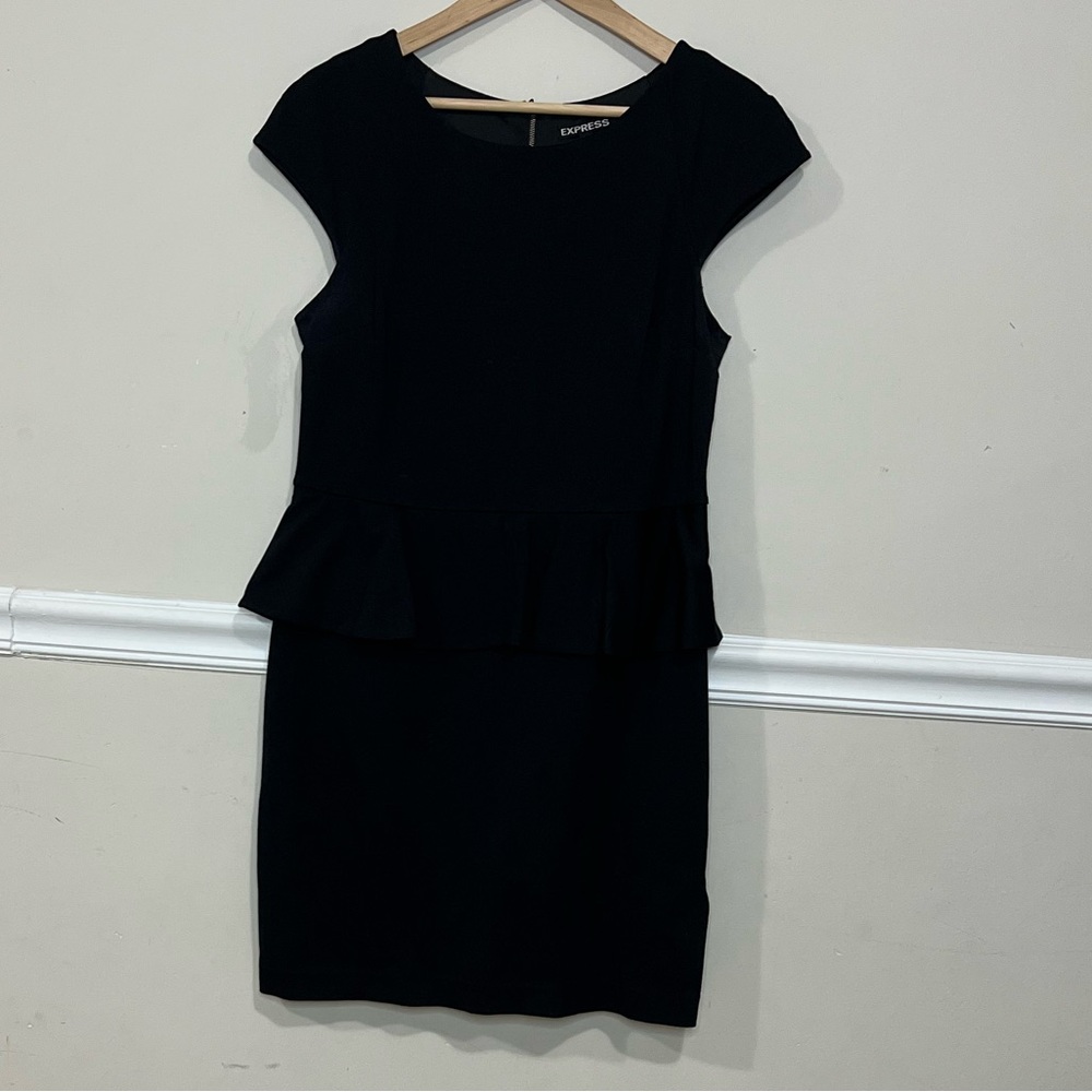 Peplum cocktail dress with lace backing